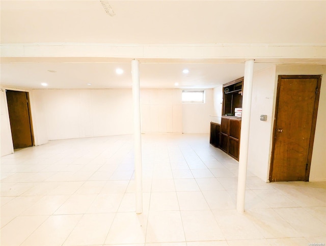 basement with light tile patterned floors