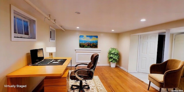 office area featuring light hardwood / wood-style flooring