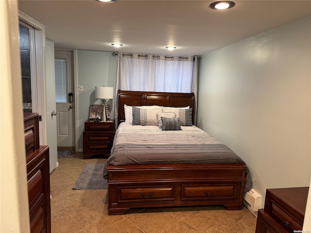 bedroom featuring a baseboard radiator