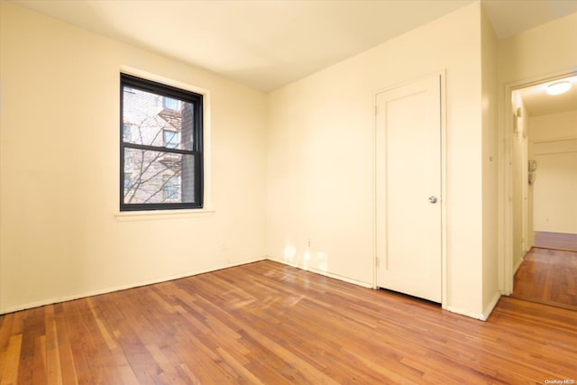 unfurnished bedroom with light hardwood / wood-style floors