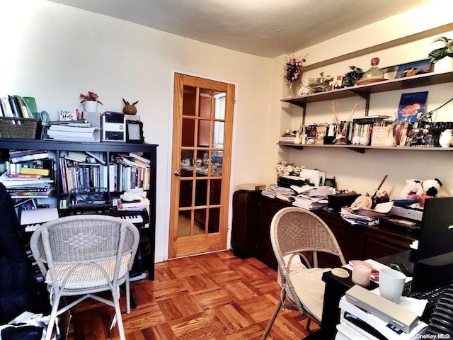 office area featuring parquet flooring