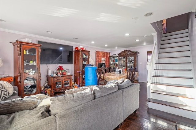 living room featuring dark hardwood / wood-style flooring and ornamental molding