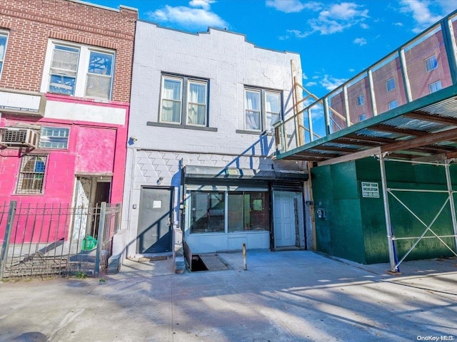 1601 Saint Johns, Brooklyn, NY 11233 - rear view of house with a wall mounted air conditioner