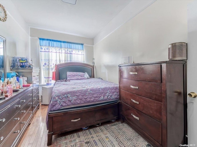 bedroom with light hardwood / wood-style floors