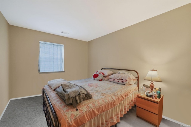 bedroom featuring carpet