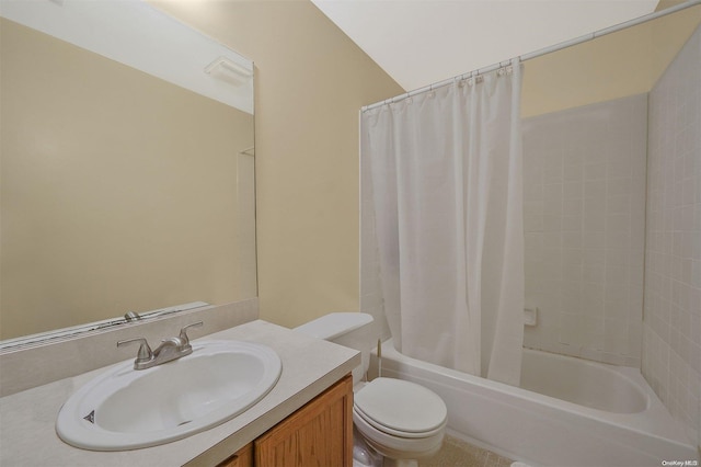 full bathroom featuring vanity, toilet, and shower / bath combo with shower curtain