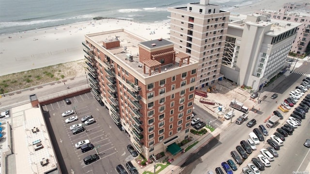 bird's eye view with a view of the beach and a water view