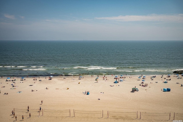 property view of water featuring a beach view