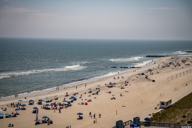 view of water feature with a beach view