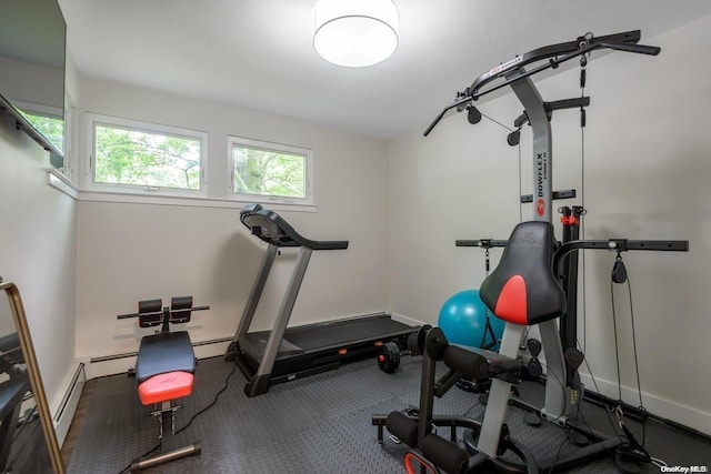 workout room with a baseboard radiator