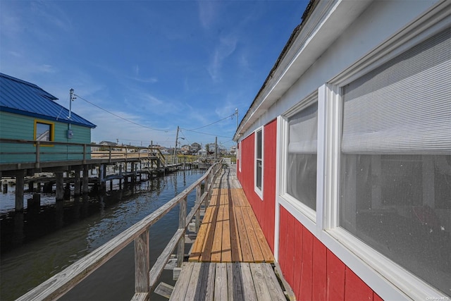 view of dock with a water view