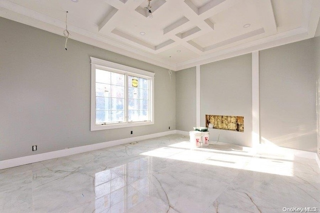 unfurnished room featuring ornamental molding, coffered ceiling, and beam ceiling