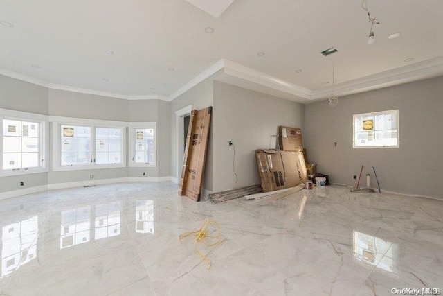 interior space featuring a wealth of natural light and ornamental molding