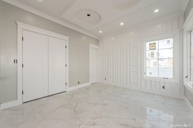 unfurnished bedroom featuring crown molding