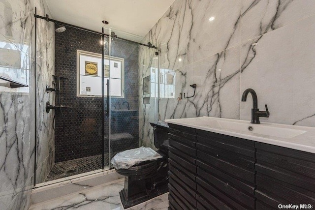 bathroom with vanity, an enclosed shower, tile walls, and toilet