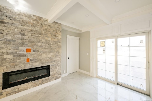 unfurnished living room with beam ceiling