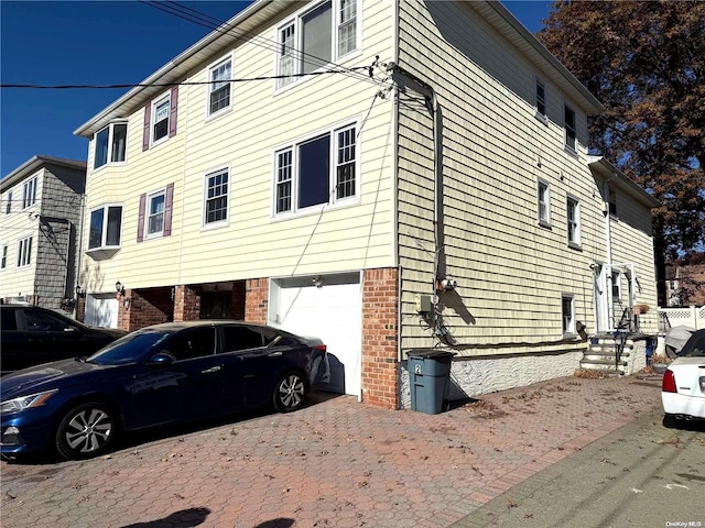 view of home's exterior with a garage