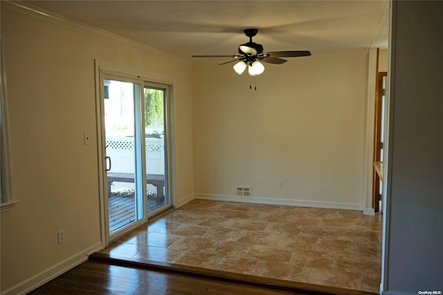 spare room featuring ceiling fan, light wood-type flooring, and ornamental molding