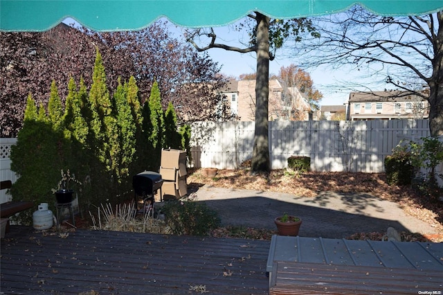 view of yard with a wooden deck