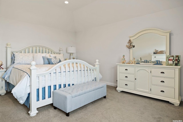 bedroom with light colored carpet