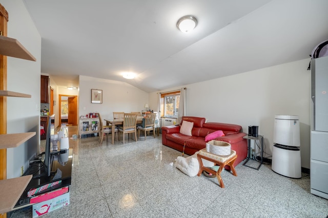 living room with vaulted ceiling