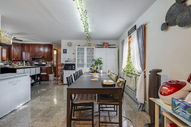 dining area featuring cooling unit