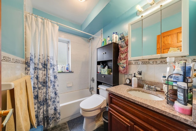 full bathroom with shower / tub combo, vanity, toilet, and tile walls