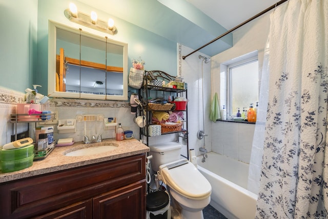 full bathroom with vanity, shower / bathtub combination with curtain, tile walls, and toilet