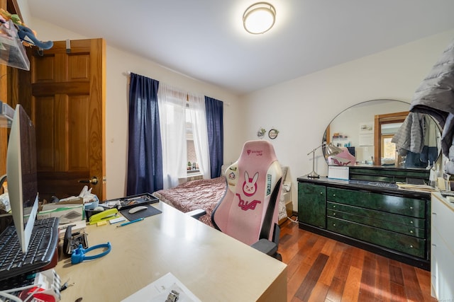 bedroom featuring dark wood-type flooring