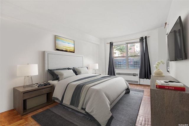 bedroom with radiator heating unit