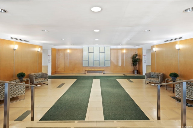 workout room with light tile patterned floors