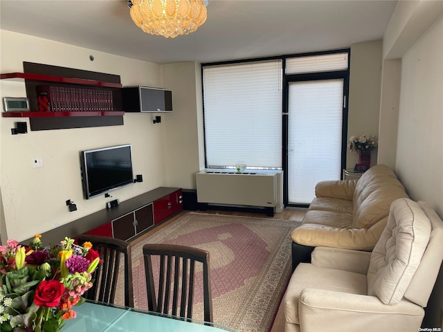 living room featuring an inviting chandelier