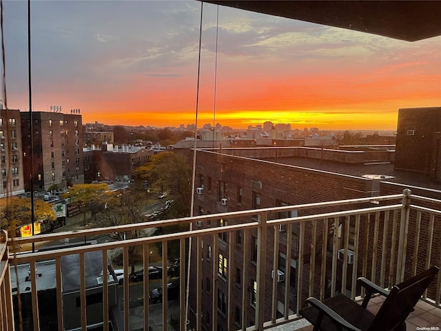 view of balcony at dusk