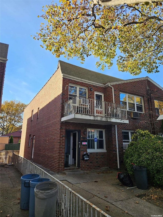 1258 E 56th St, Brooklyn, NY 11234 - view of front of home featuring brick siding and a balcony