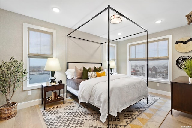 bedroom featuring wood-type flooring