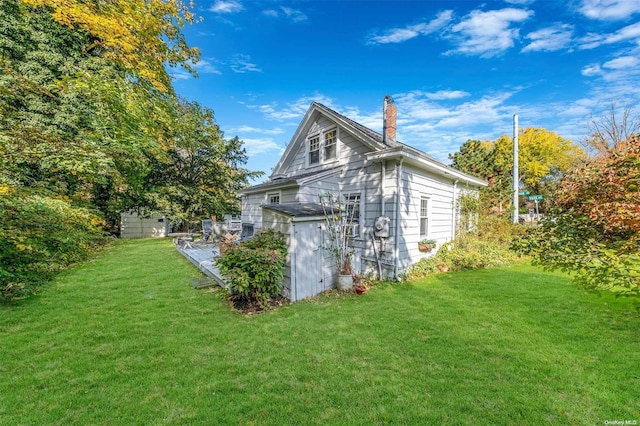 view of home's exterior featuring a lawn