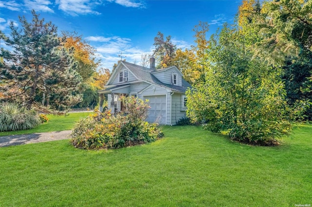 view of home's exterior with a lawn