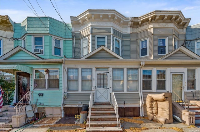 view of front of home featuring cooling unit