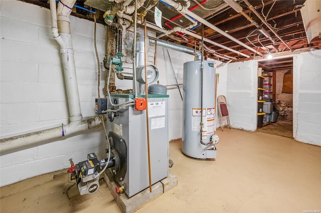 utility room featuring water heater