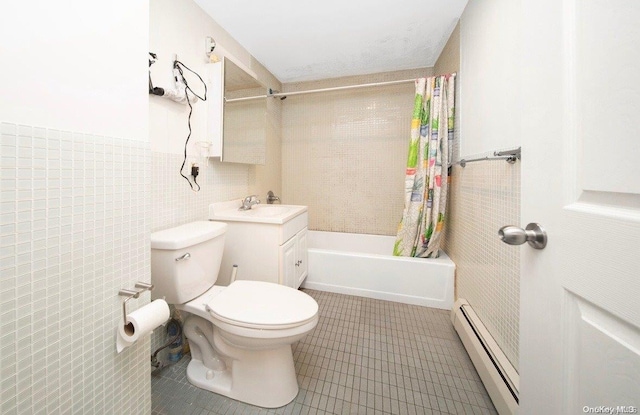 full bathroom featuring shower / tub combo, vanity, a baseboard radiator, tile walls, and toilet