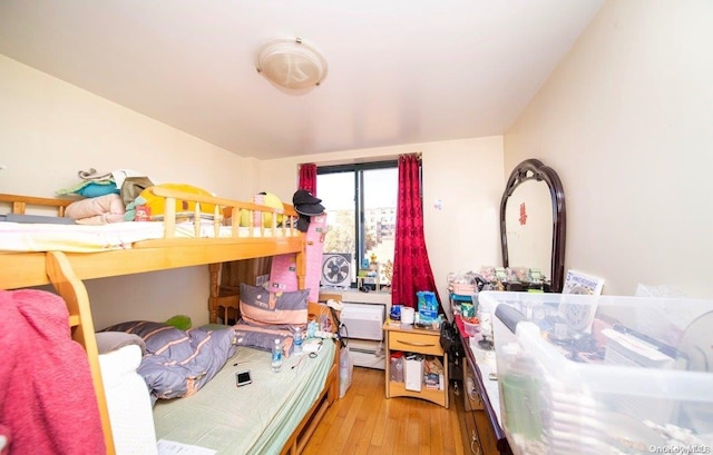 bedroom with light wood-type flooring