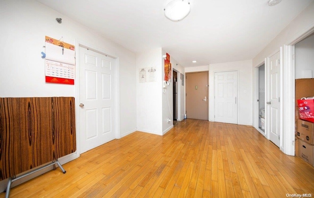 hallway featuring light wood-type flooring