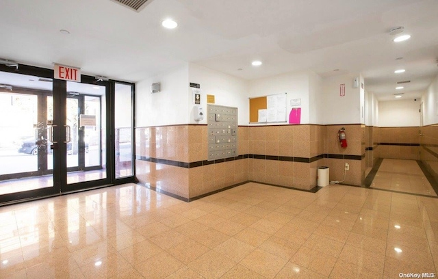 136-16 35th Ave Unit 7C, Flushing, NY 11354 - building lobby featuring wainscoting and recessed lighting