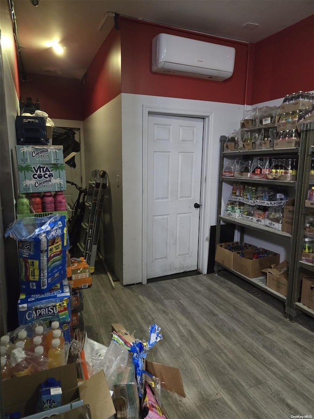 storage area featuring an AC wall unit