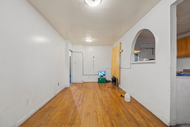 spare room with light hardwood / wood-style flooring