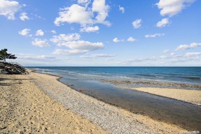 view of water feature featuring a beach view