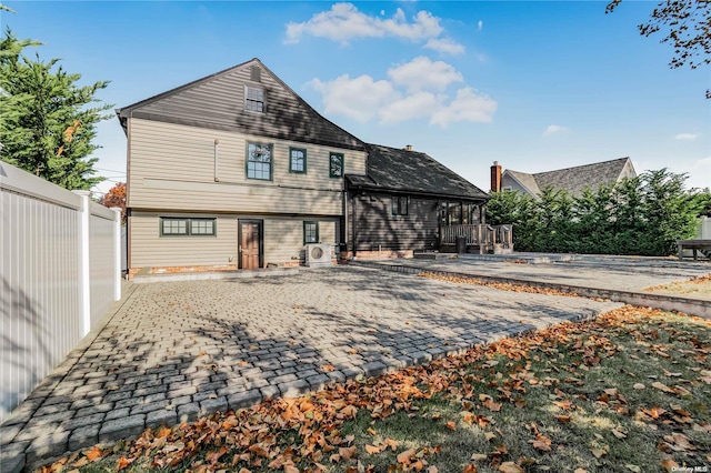 back of house with a patio area