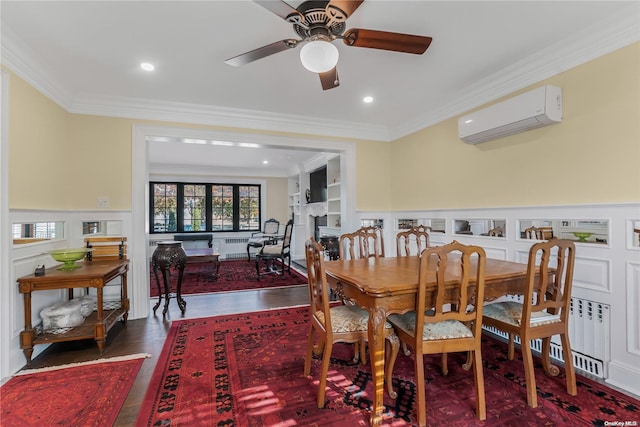 dining space featuring dark hardwood / wood-style floors, ceiling fan, ornamental molding, and a wall mounted AC