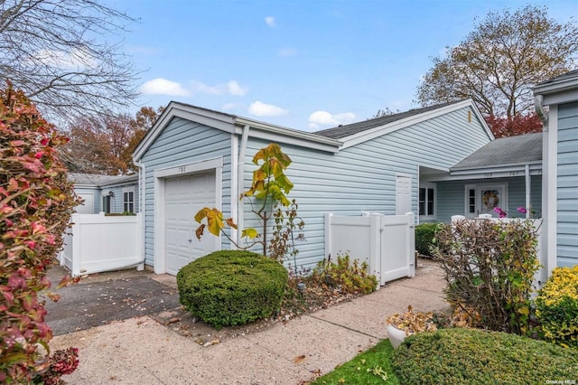 view of home's exterior with a garage