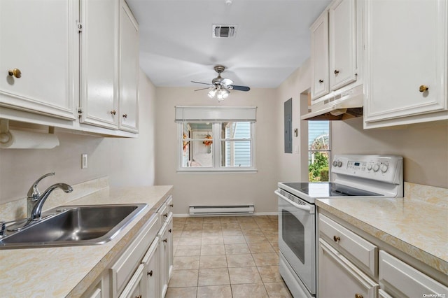 kitchen with a baseboard heating unit, sink, light tile patterned floors, white cabinets, and white range with electric cooktop